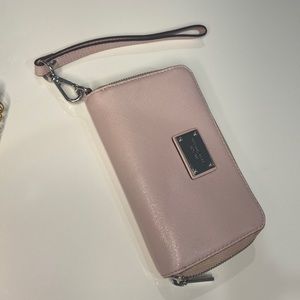 MICHAEL KORS light pink medium size wristlet.